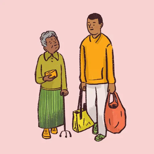 young man carrying bags for an old woman