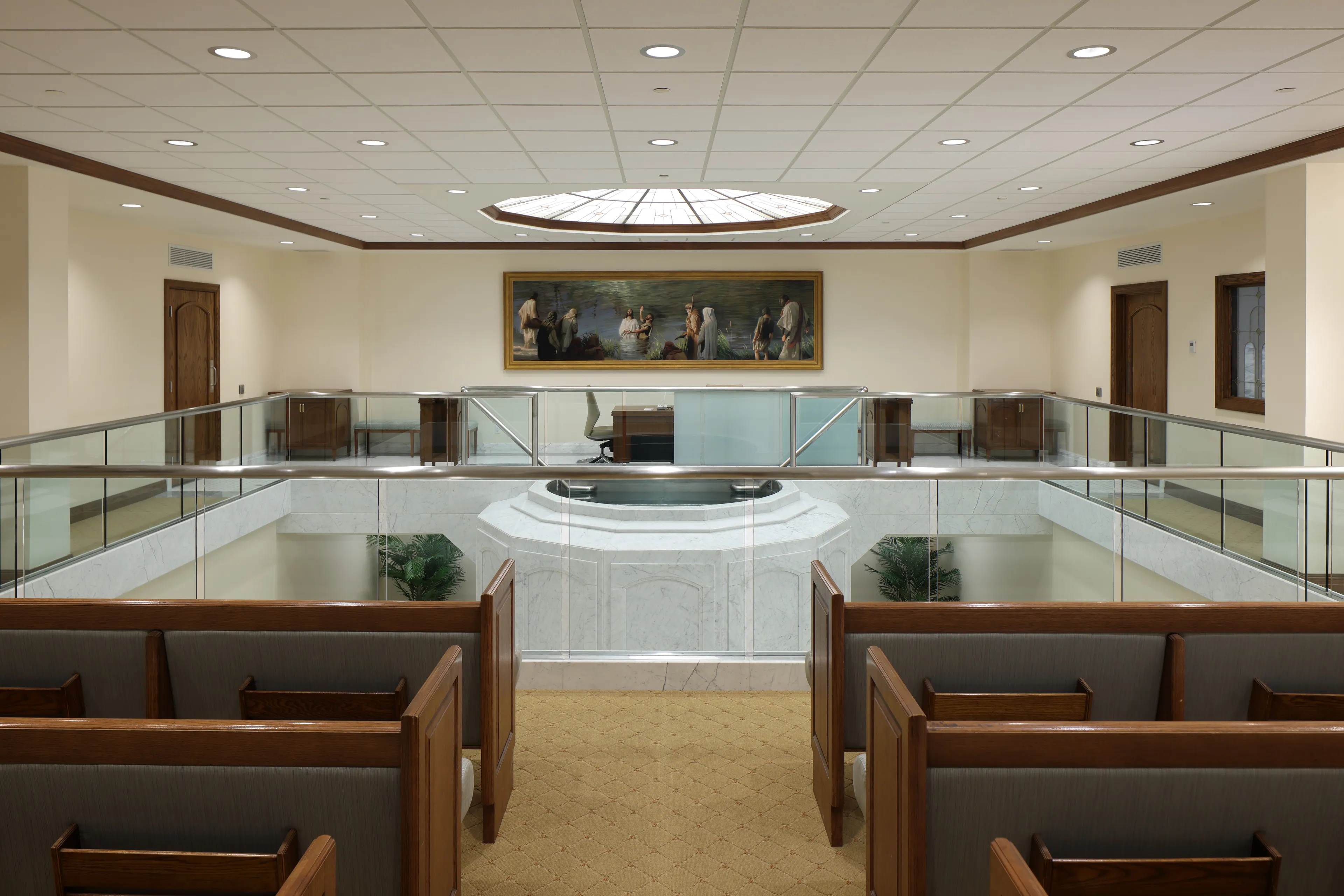 Interior image of the Toronto Ontario Temple inside the baptistry. The image highlights the room around the font. © undefined ipCode 1.