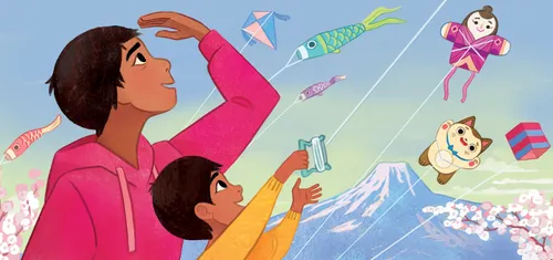 A boy and his father flying kites with a mountain in the background