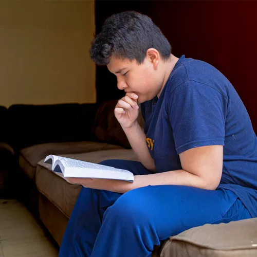 young man reading scriptures
