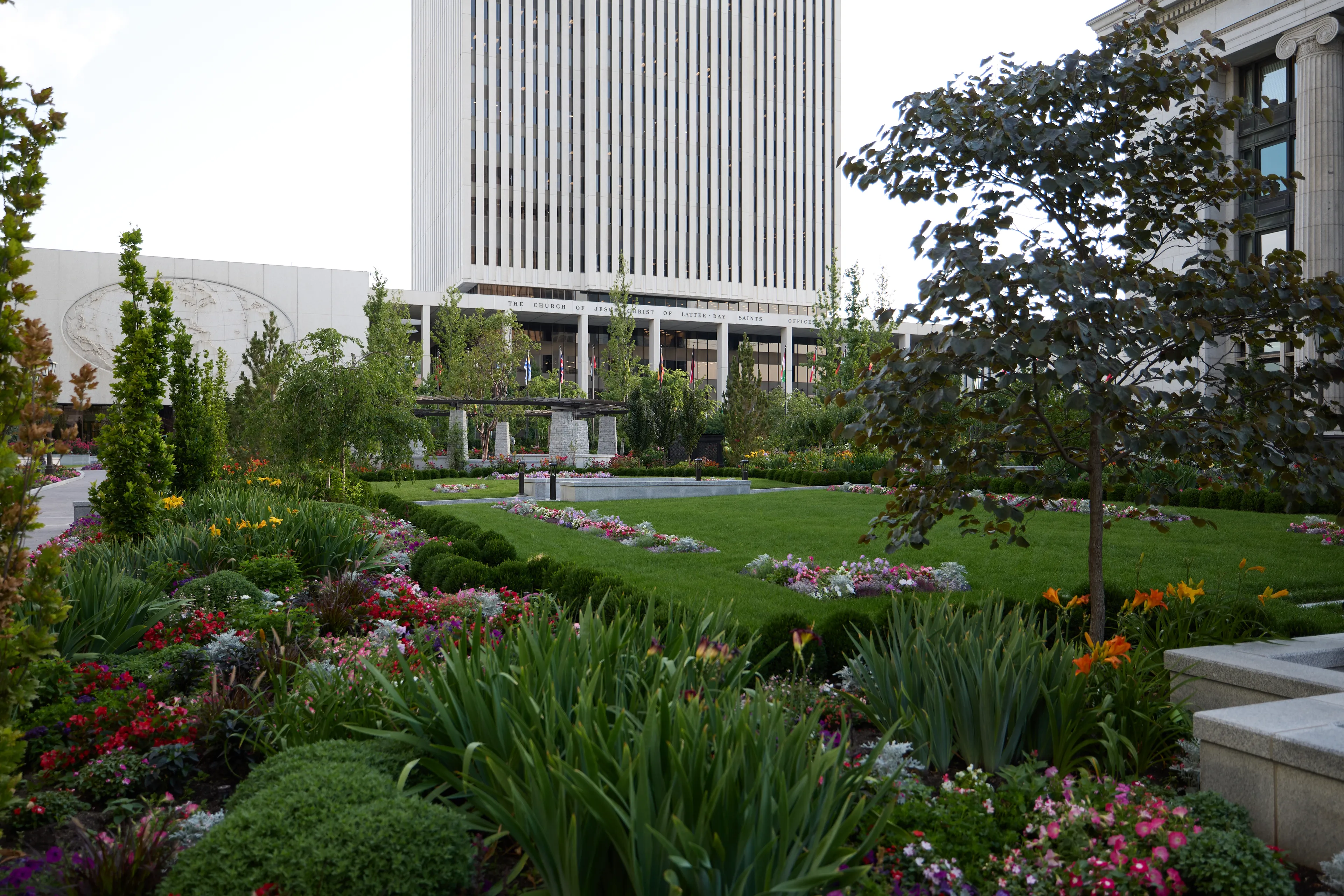 A view of Temple Square during renovations in July 2025. The image features an overview of landscaping at the Church Office Building Plaza.
