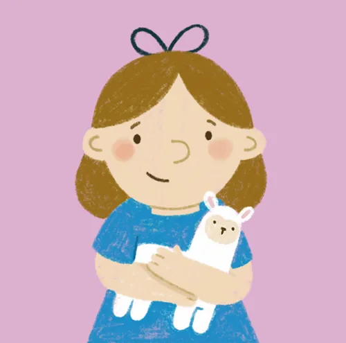 Girl smiling as she hugs her stuffed animal