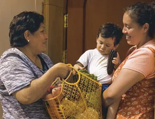 woman sharing groceries