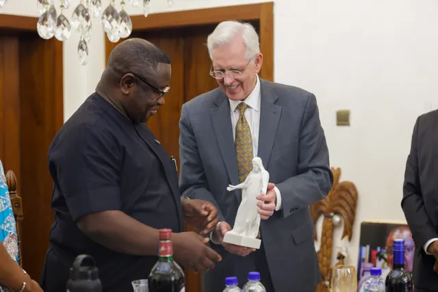 Elder D. Todd Christofferson of the Quorum of the Twelve Apostles gifts His Excellency Julius Maada Wonie Bio, president of Sierra Leone, a Christus statue during a visit in Freetown, Sierra Leone, on Thursday, February 20, 2025.
