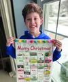Boy holding a handmade advent calendar