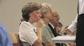woman taking the sacrament