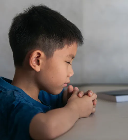 Boy praying
