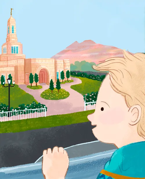 Boy looking out car window at a temple