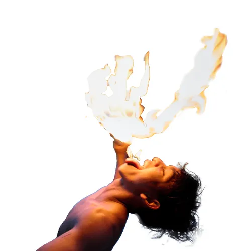 young man transferring flame with his tongue