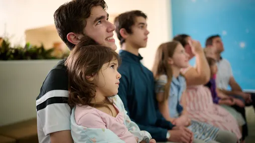 Families explore inside the Independence Visitors' Center.