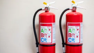 Fire extinguisher system on the wall background
