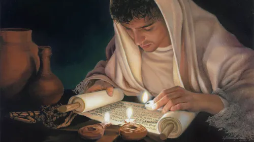 A young man in ancient times reading from a scroll