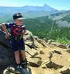 Smiling boy in the mountains