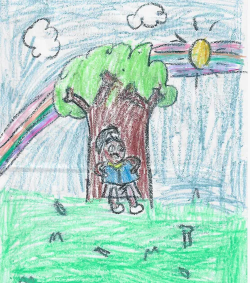 Child’s drawing of a girl under a tree with a rainbow in the background