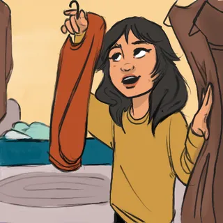 young woman looking through closet