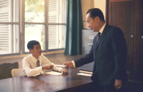 branch president receiving a tithing donation