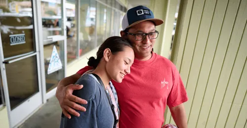 young woman with a family member