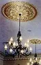 Three chandeliers were made to duplicate those in early photographs