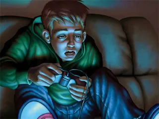 young man playing video games