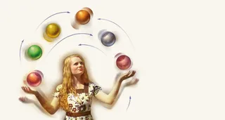 girl juggling several balls