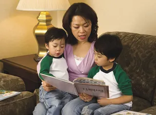 mother reading to children