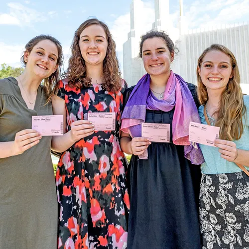 young women outside the temple