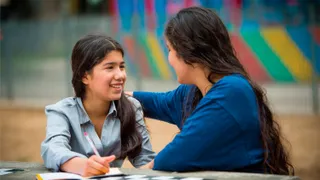 A mother and her teenage daughter interacting in an outdoor setting. Shot in Argentina