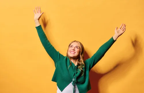 the author in a cheering pose