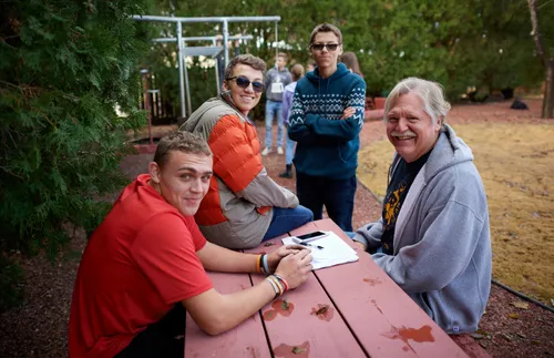 group gathered at a table