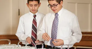 young men at sacrament table