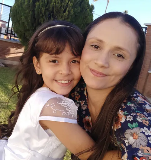 Emily and her mom hugging