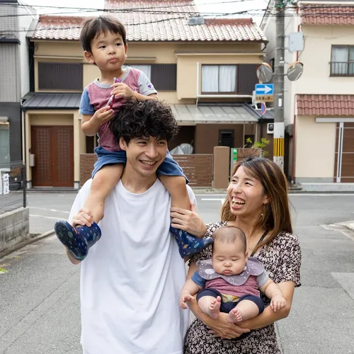 family walking together on street