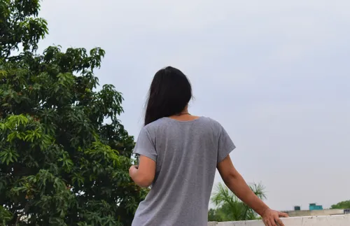 a young woman looking into the distance