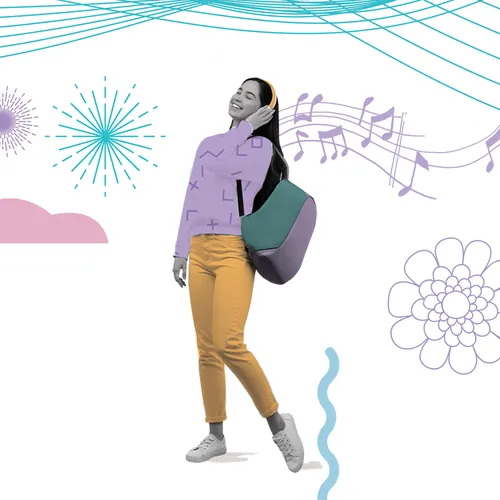 young woman listening to music on headphones