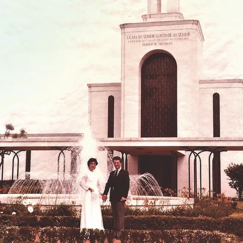 Elder and Sister Soares in front of the temple on their wedding day