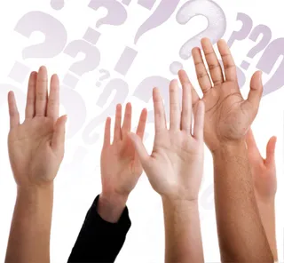 question marks and raised hands