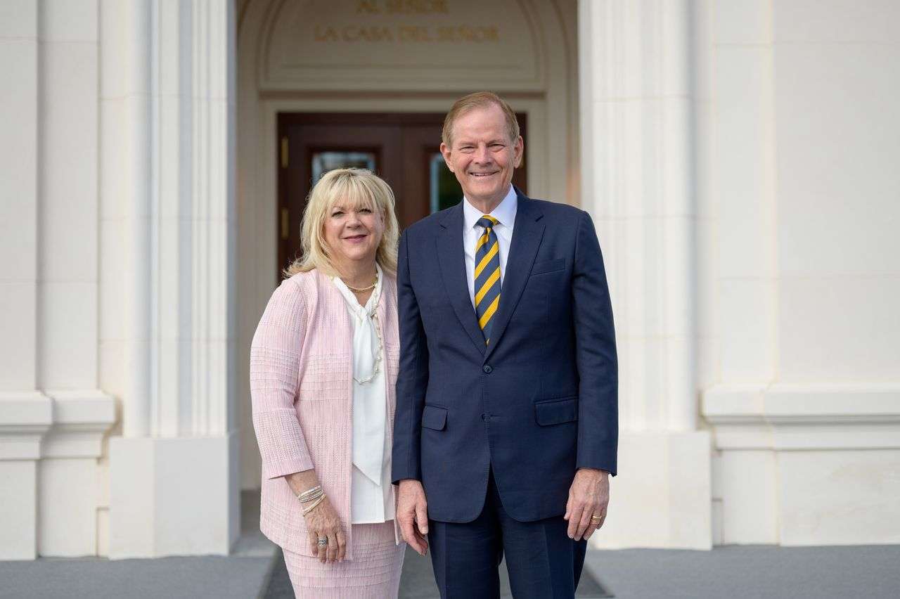 Elder and Sister Stevenson standing in front of the Antofagasta Temple